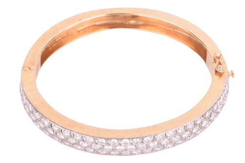 Lot 45 - A diamond-set hinged bracelet, consisting of...