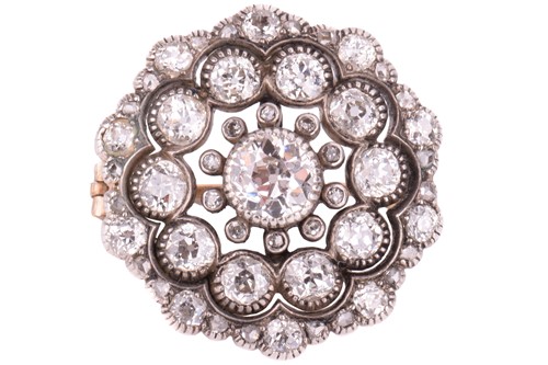 Lot 246 - A Victorian diamond brooch, set to the centre...