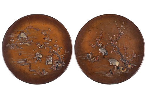 Lot 4 - A matched pair of Japanese bronze circular...