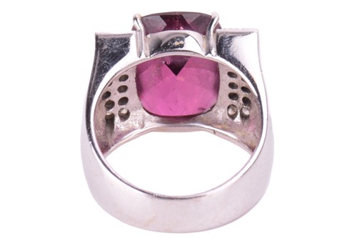 Lot 240 - A pink tourmaline and diamond dress ring, set...