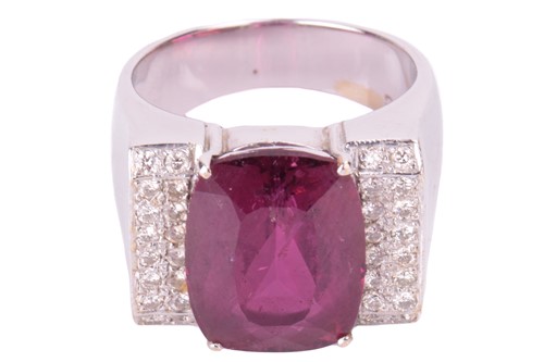 Lot 240 - A pink tourmaline and diamond dress ring, set...