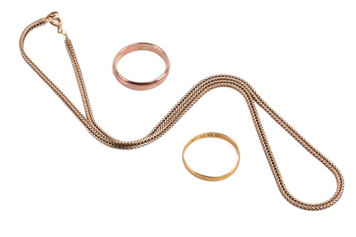 Lot 37 - Two wedding bands and a chain necklace; the...