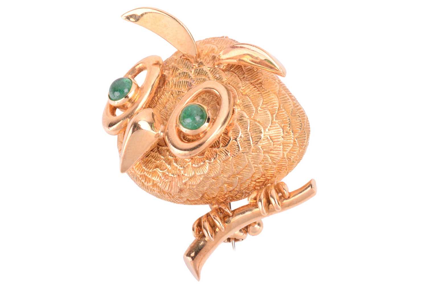 Lot 239 - Cartier - an emerald-set brooch in the form of...