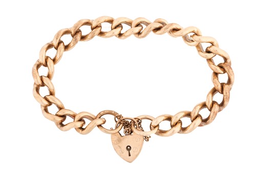 Lot 211 - A 9ct yellow gold heavy curb link and padlock...
