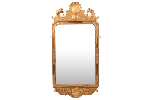 Lot 151 - A George II style giltwood wall mirror, the...