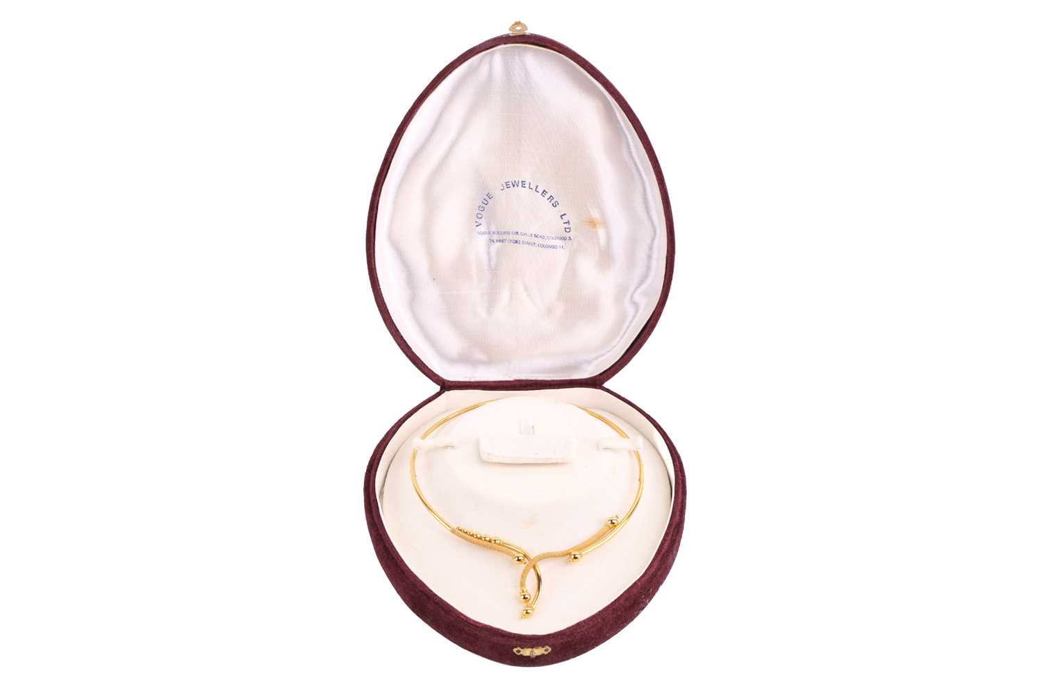 Lot 52 - An abstract choker necklace, in a curvilinear...
