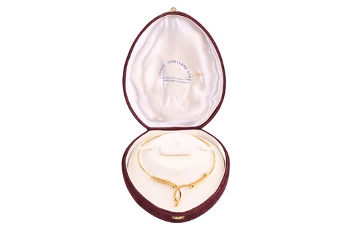 Lot 52 - An abstract choker necklace, in a curvilinear...