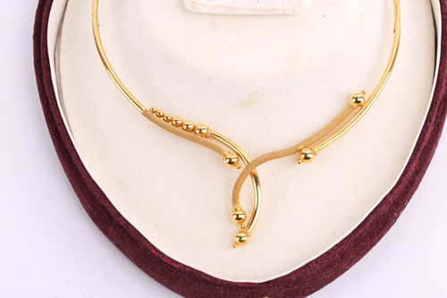 Lot 52 - An abstract choker necklace, in a curvilinear...