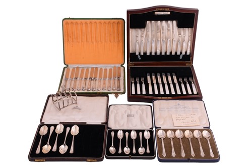 Lot 402 - A set of twelve mother of pearl handled silver...