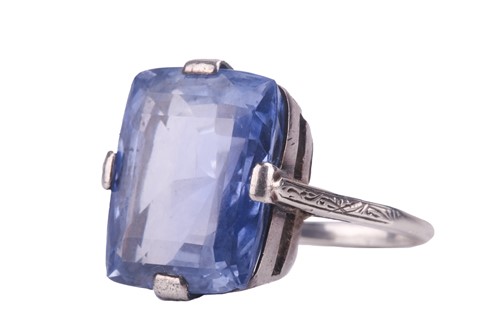 Lot 297 - A Ceylon sapphire single stone ring, set with...