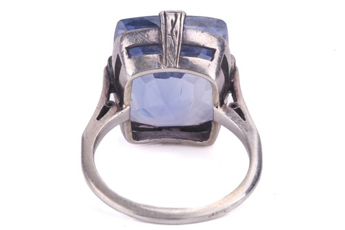Lot 297 - A Ceylon sapphire single stone ring, set with...