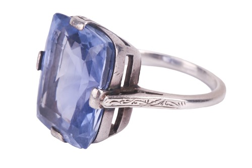 Lot 297 - A Ceylon sapphire single stone ring, set with...