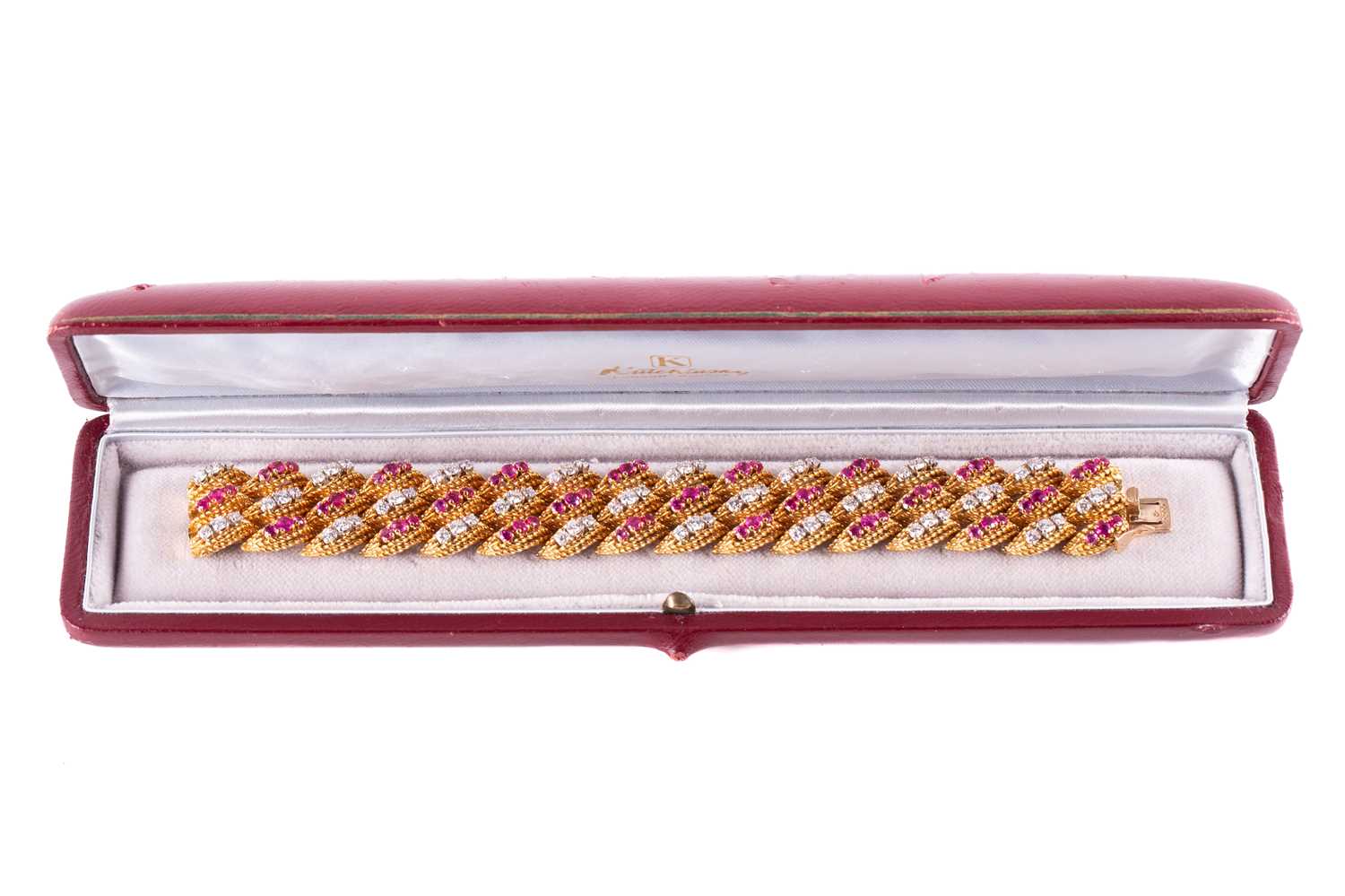 Lot 241 - Kutchinsky – a diamond and ruby bracelet