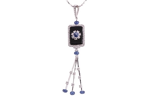 Lot 69 - An onyx, sapphire and diamond lavaliere...
