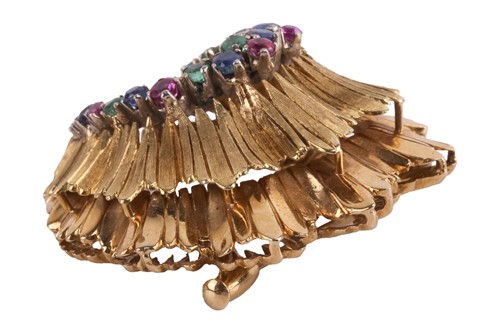 Lot 51 - A sapphire, ruby and emerald tiered swirl...