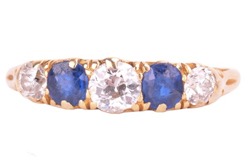 Lot 105 - A sapphire and diamond half hoop ring,...