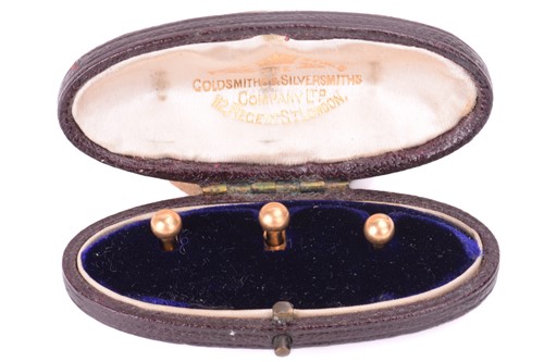 Lot 205 - A set of three shirt studs, each featuring a...