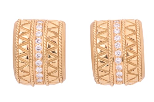 Lot 243 - A pair of diamond set curved earrings, each...