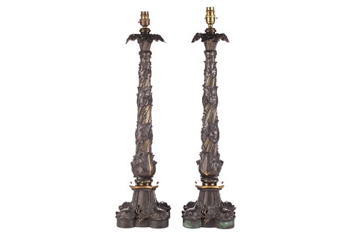 Lot 142 - A pair of Victorian-patinated bronze table...