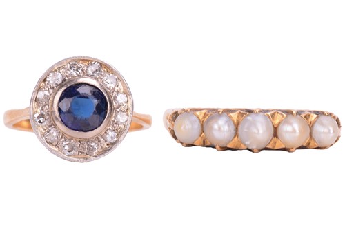 Lot 246 - A sapphire and diamond cluster ring and a five...