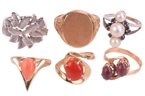 Lot 10 - A collection of six rings, including pearl set...