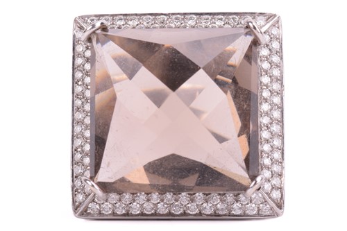 Lot 5 - A smokey quartz and diamond cocktail ring, set...