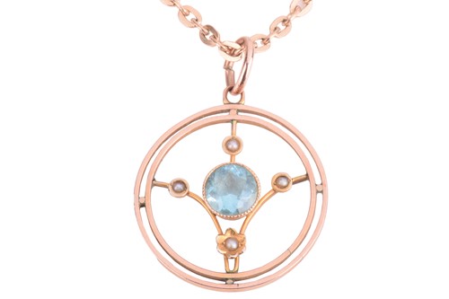 Lot 234 - An open circle pendant in yellow metal marked '...