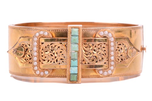 Lot 1 - A Victorian buckle bangle in yellow metal...