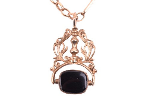 Lot 55 - A swivel fob and chain in 9ct yellow gold,...
