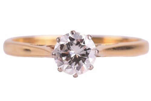 Lot 20 - A single stone diamond ring; the round...
