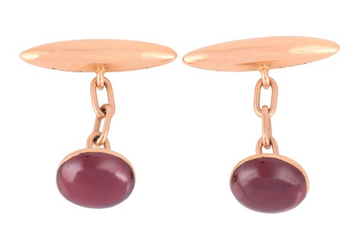 Lot 111 - A pair of garnet cabochon cufflinks,...