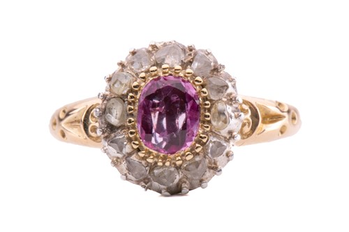 Lot 4 - A pink sapphire and diamond set cluster ring,...