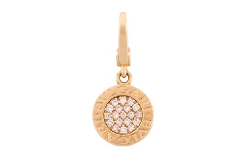 Lot 35 - Bulgari - a diamond-set charm, circular plaque...