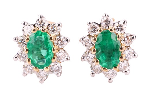 Lot 25 - A pair of emerald and diamond cluster earrings,...