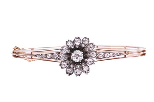 Lot 1 - A Victorian floral diamond-set bangle/pendant,...