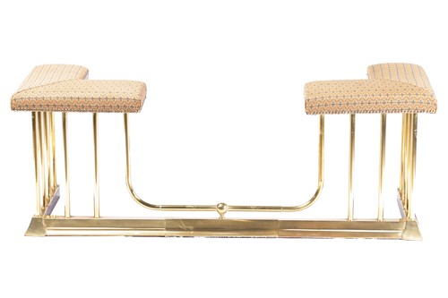 Lot 125 - A brass Club Fender, 20th century, with drop...