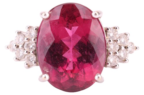 Lot 18 - A rubellite and diamond ring, the oval...