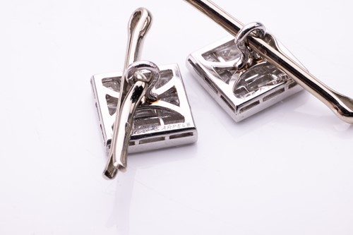 Lot 185 - Van Cleef & Arpels - a boxed diamond dress set,...