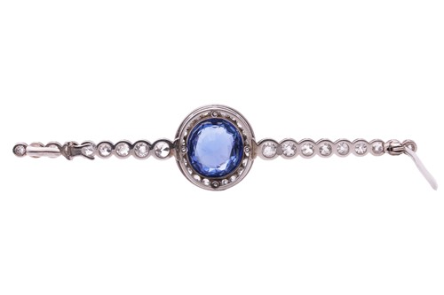 Lot 201 - An Art Deco sapphire and diamond set bar...
