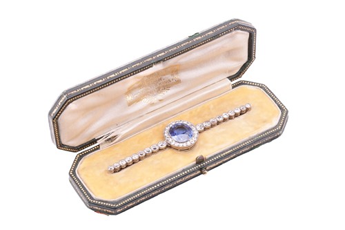 Lot 201 - An Art Deco sapphire and diamond set bar...