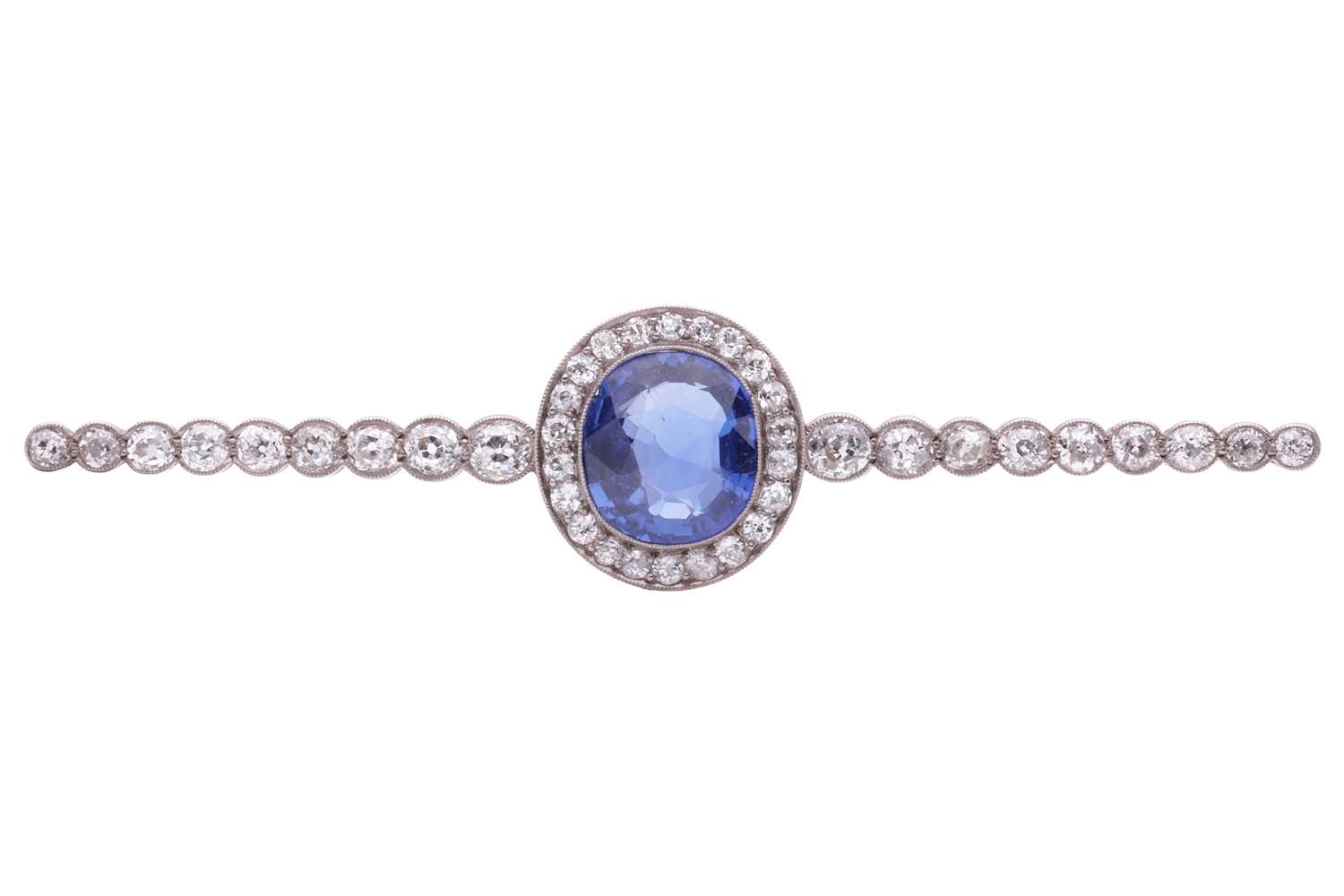 Lot 201 - An Art Deco sapphire and diamond set bar...