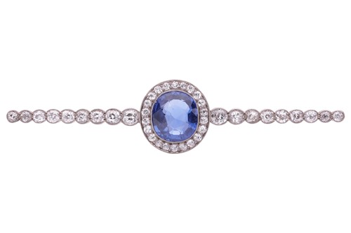 Lot 201 - An Art Deco sapphire and diamond set bar...