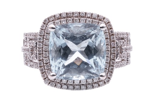 Lot 9 - An aquamarine and diamond cocktail ring in...