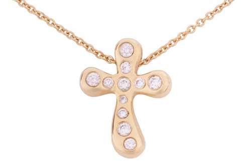 Lot 50 - A diamond set cross pendant and chain, by Elsa...