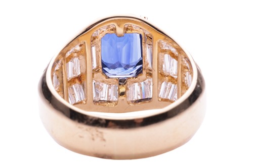 Lot 52 - A sapphire and diamond dress ring, the emerald...