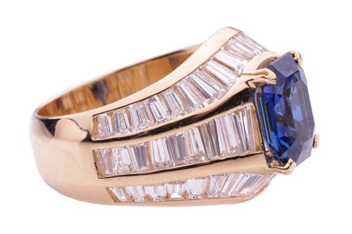 Lot 52 - A sapphire and diamond dress ring, the emerald...