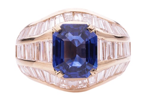 Lot 52 - A sapphire and diamond dress ring, the emerald...