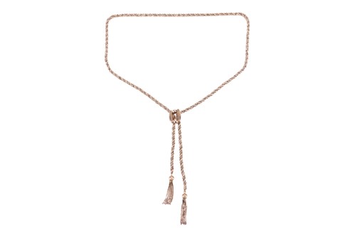 Lot 23 - A twisted roped lariat necklace in 9ct gold,...