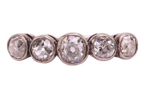 Lot 17 - A diamond five stone half hoop ring, set with...