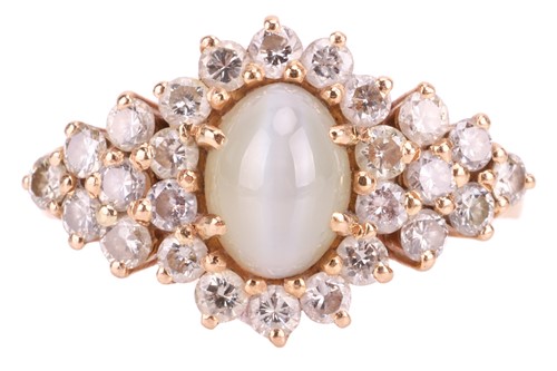 Lot 43 - A cat's eye chrysoberyl and diamond dress ring....